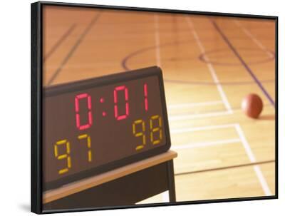 'Digital Scoreboard Noting the Score and Time Left on Clock During