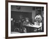 Dilapidated Shabby Man Sitting at the Table with a Cup of Coffee, Listening Dreamily to the Music-Peter Stackpole-Framed Premium Photographic Print