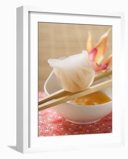 Dim Sum on Chopsticks over Dip (Asia)-null-Framed Photographic Print