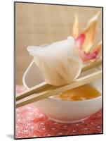 Dim Sum on Chopsticks over Dip (Asia)-null-Mounted Photographic Print