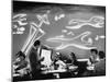 Dimly Lit Wall of the Sea Restaurant, with Customers Reading Their Menus with Flashlights-Wallace Kirkland-Mounted Photographic Print