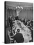 Dinner Party Hosted by Egyptian Prince Abdel Moneim at Palace Hotel in Fashionable Winter Resort-Alfred Eisenstaedt-Stretched Canvas