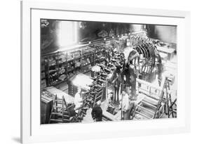 Diplodocus Dinosaur Being Assembled In Paris Museum-null-Framed Art Print