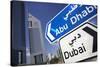 Direction Signs on Sheikh Zayed Road in Dubai-Jon Hicks-Stretched Canvas