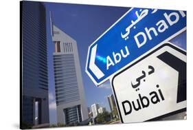 Direction Signs on Sheikh Zayed Road in Dubai-Jon Hicks-Stretched Canvas