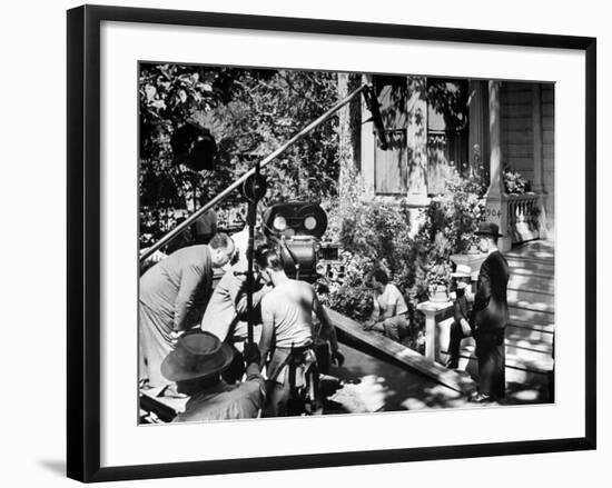 Director Alfred Hitchcock, Bending over to Watch a Rehearsal Through the Camera-J^ R^ Eyerman-Framed Premium Photographic Print