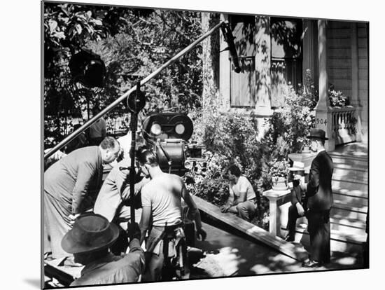 Director Alfred Hitchcock, Bending over to Watch a Rehearsal Through the Camera-J^ R^ Eyerman-Mounted Premium Photographic Print