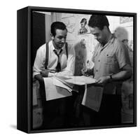 Director Walt Disney Looking over Sketches from His Latest Picture "Pinocchio."-Peter Stackpole-Framed Stretched Canvas