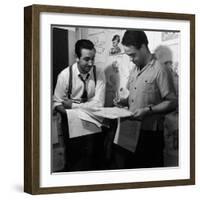 Director Walt Disney Looking over Sketches from His Latest Picture "Pinocchio."-Peter Stackpole-Framed Premium Photographic Print