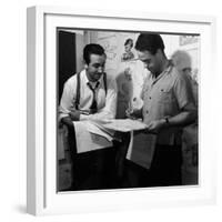 Director Walt Disney Looking over Sketches from His Latest Picture "Pinocchio."-Peter Stackpole-Framed Premium Photographic Print