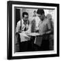 Director Walt Disney Looking over Sketches from His Latest Picture "Pinocchio."-Peter Stackpole-Framed Premium Photographic Print