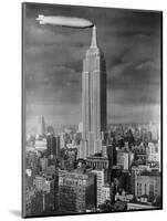 Dirigible Docked at Empire State Building-null-Mounted Photographic Print