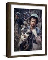 Dirty, Exhausted Looking US Marine on Patrol with His Squad Near the DMZ During the Vietnam War-Larry Burrows-Framed Premium Photographic Print