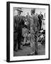 Discharged Gi Looking at New Suit Fashions-Nina Leen-Framed Photographic Print