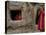 Displaced Girls Smile as They Look Out from a Shanty, in a Refugee Camp in Kabul, Afghanistan-null-Stretched Canvas