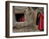 Displaced Girls Smile as They Look Out from a Shanty, in a Refugee Camp in Kabul, Afghanistan-null-Framed Photographic Print