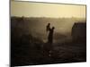 Displaced Man Holds His Baby Next to His Tent in Jalozai Refugee Camp Near Peshawar, Pakistan-null-Mounted Photographic Print