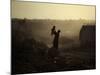 Displaced Man Holds His Baby Next to His Tent in Jalozai Refugee Camp Near Peshawar, Pakistan-null-Mounted Photographic Print