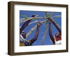 Displaced Sudanese Women Try to Rebuild their Tents in Refugee Camp in the Darfur Area of Sudan-null-Framed Photographic Print