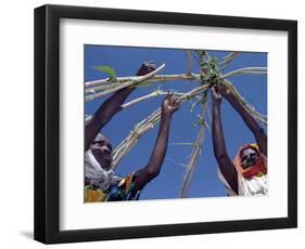 Displaced Sudanese Women Try to Rebuild their Tents in Refugee Camp in the Darfur Area of Sudan-null-Framed Photographic Print