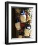 Display of Local Wine for Sale, Siena, Tuscany, Italy-Ruth Tomlinson-Framed Premium Photographic Print