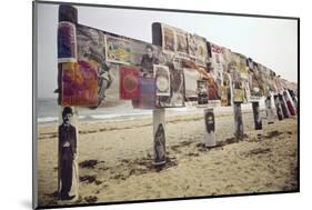 Display of Posters Mounted on Pilings in the Sand, Montauk Point, Long Island, New York, 1967-Henry Groskinsky-Mounted Photographic Print