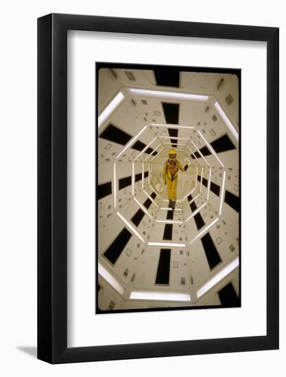 Distance Shot of Actor in Astronaut Suit Walking Through Geometrically Designed Hal Computer Center-Dmitri Kessel-Framed Photographic Print