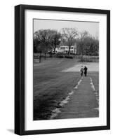 Distant of Mathematicians Albert Einstein and Kurt Godel Taking a Walk-Leonard Mccombe-Framed Premium Photographic Print