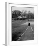 Distant of Mathematicians Albert Einstein and Kurt Godel Taking a Walk-Leonard Mccombe-Framed Premium Photographic Print