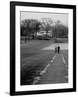 Distant of Mathematicians Albert Einstein and Kurt Godel Taking a Walk-Leonard Mccombe-Framed Premium Photographic Print