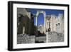 Distant Roman Capitol of Dougga Seen Through an Arch, 2nd Century-CM Dixon-Framed Photographic Print