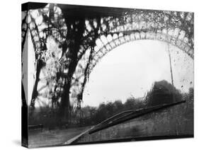 Distorted View of Eiffel Tower through Windshield-null-Stretched Canvas