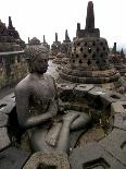 A Statue of Buddha Sits on a Terrace-Dita Alangkara-Stretched Canvas