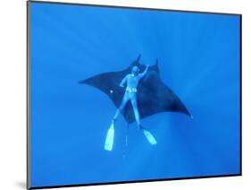 Diver Holds on to Giant Manta Ray, Mexico-Jeffrey Rotman-Mounted Photographic Print