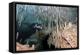 Diver Using Side Mount Gear in Cave in Mexico-null-Framed Stretched Canvas