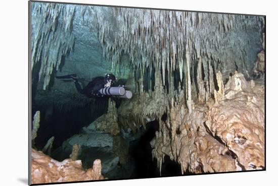 Diver Using Side Mount Gear in Cave in Mexico-null-Mounted Photographic Print