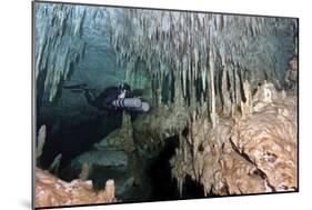 Diver Using Side Mount Gear in Cave in Mexico-null-Mounted Photographic Print