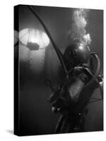 Diver Wearing Deep Sea Diving Suit in the Water-null-Stretched Canvas