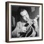 Django Reinhardt at the Aquarium in New York City, 1946-William Paul Gottlieb-Framed Photographic Print