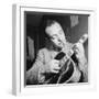 Django Reinhardt at the Aquarium in New York City, 1946-William Paul Gottlieb-Framed Photographic Print