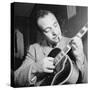 Django Reinhardt at the Aquarium in New York City, 1946-William Paul Gottlieb-Stretched Canvas