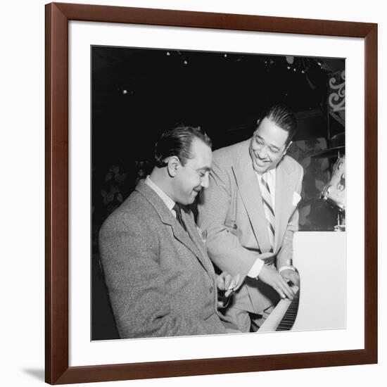 Django Reinhardt at the Aquarium in New York City, 1946-William Paul Gottlieb-Framed Photographic Print