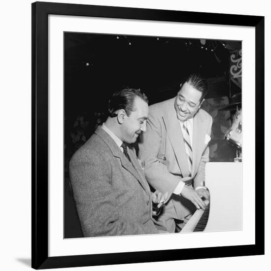 Django Reinhardt at the Aquarium in New York City, 1946-William Paul Gottlieb-Framed Photographic Print