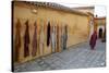Djellaba Garments Hanging on a Wall, Chefchaouen, Morocco, North Africa, Africa-Simon Montgomery-Stretched Canvas