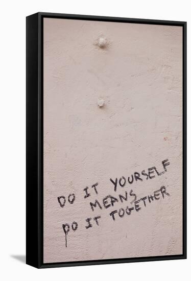 Do it yourself means do it together sign on wall, Altstadt, Freiburg Im Breisgau, Black Forest,...-null-Framed Stretched Canvas