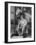 "Doby Doc" Sitting in Front of One of the First "Iron Horses" in the West-null-Framed Photographic Print