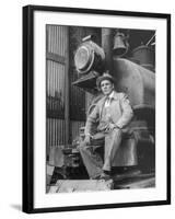 "Doby Doc" Sitting in Front of One of the First "Iron Horses" in the West-null-Framed Photographic Print