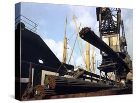 Dockers Loading Steel Bars onto the Manchester Renown, Manchester, 1964-Michael Walters-Stretched Canvas