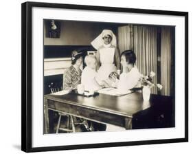 Doctor Examines a Baby at a Dispensary-null-Framed Photographic Print