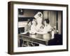 Doctor Examines a Baby at a Dispensary-null-Framed Photographic Print